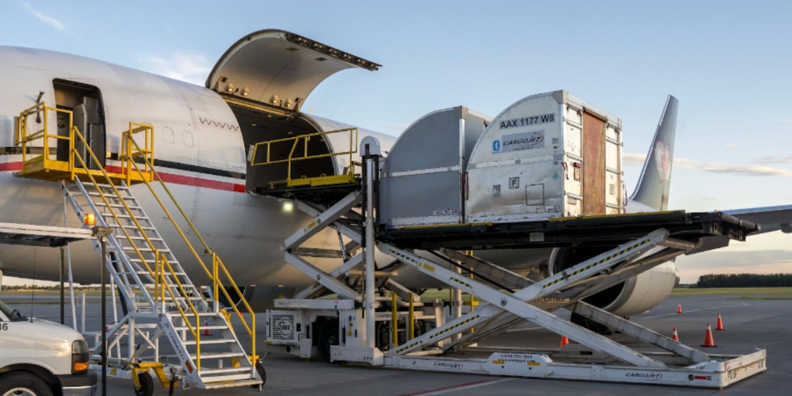 An image of pallets being loaded onto a Cargojet for express delivery